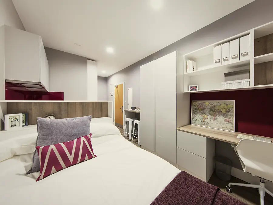 Standard Studio at AXO Kingston: Bed, desk and storage