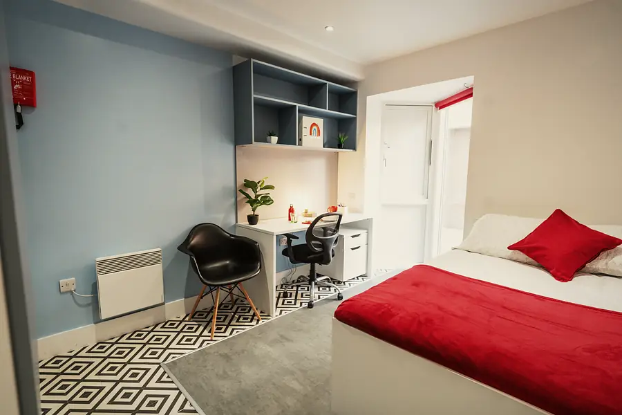 Premium Studio at Sherbourne Student Village: Bed and study space